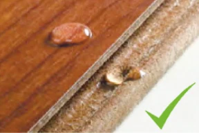 Water beading on a wax-coated plank edge